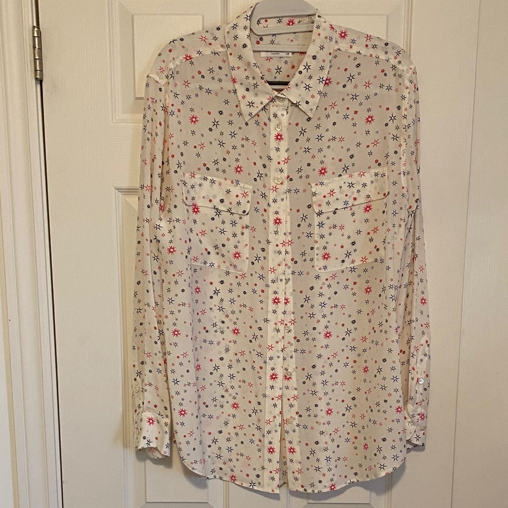 Equipment 100% pure silk women’s blouse
Size Large
Ivory colour with pink/black